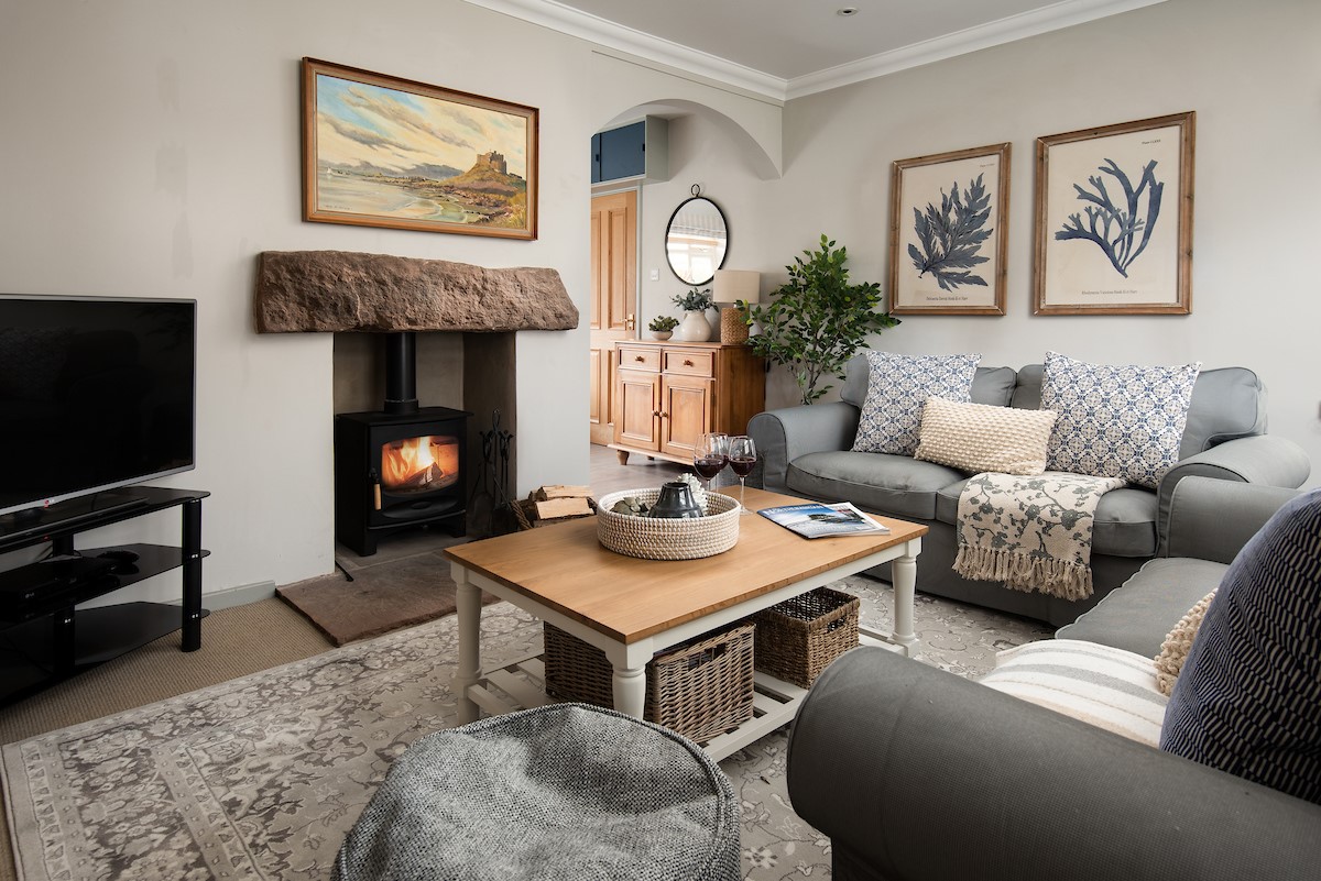 Greengate - sitting room with two sofas, log burner and Smart TV