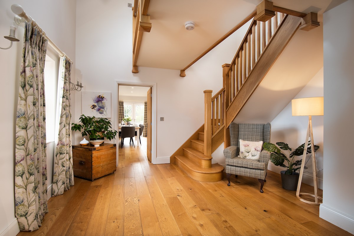 Bracken Lodge - spacious entrance hall with staircase to first floor