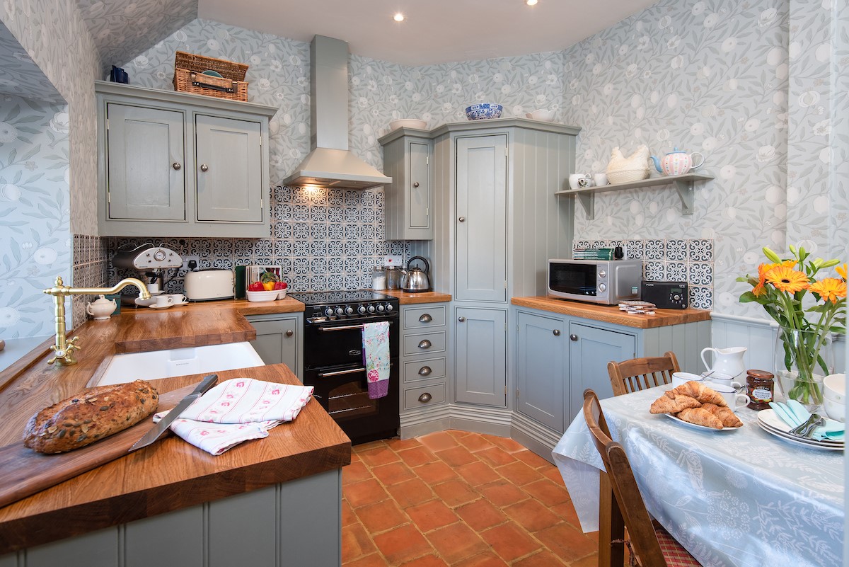 The Cottage - kitchen with William Morris wallpaper