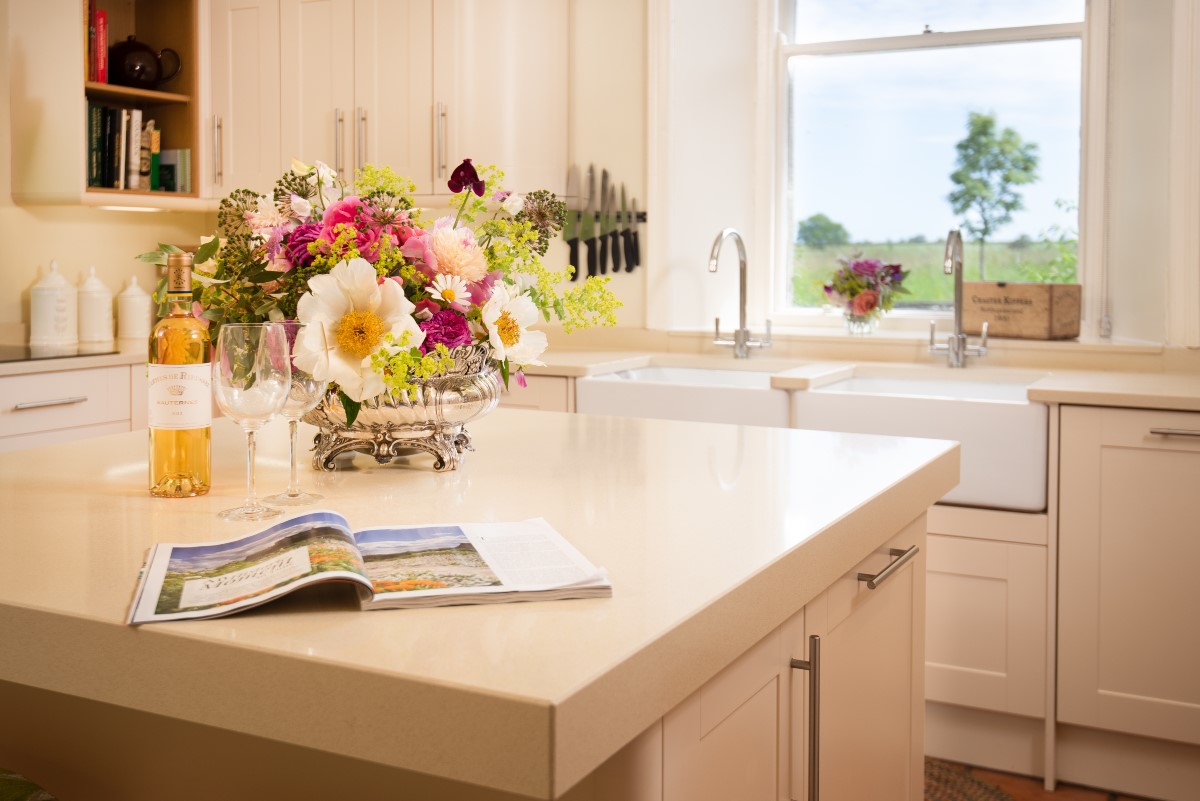 Brunton House - kitchen island, double Belfast sinks with view overlooking Northumbrian countryside