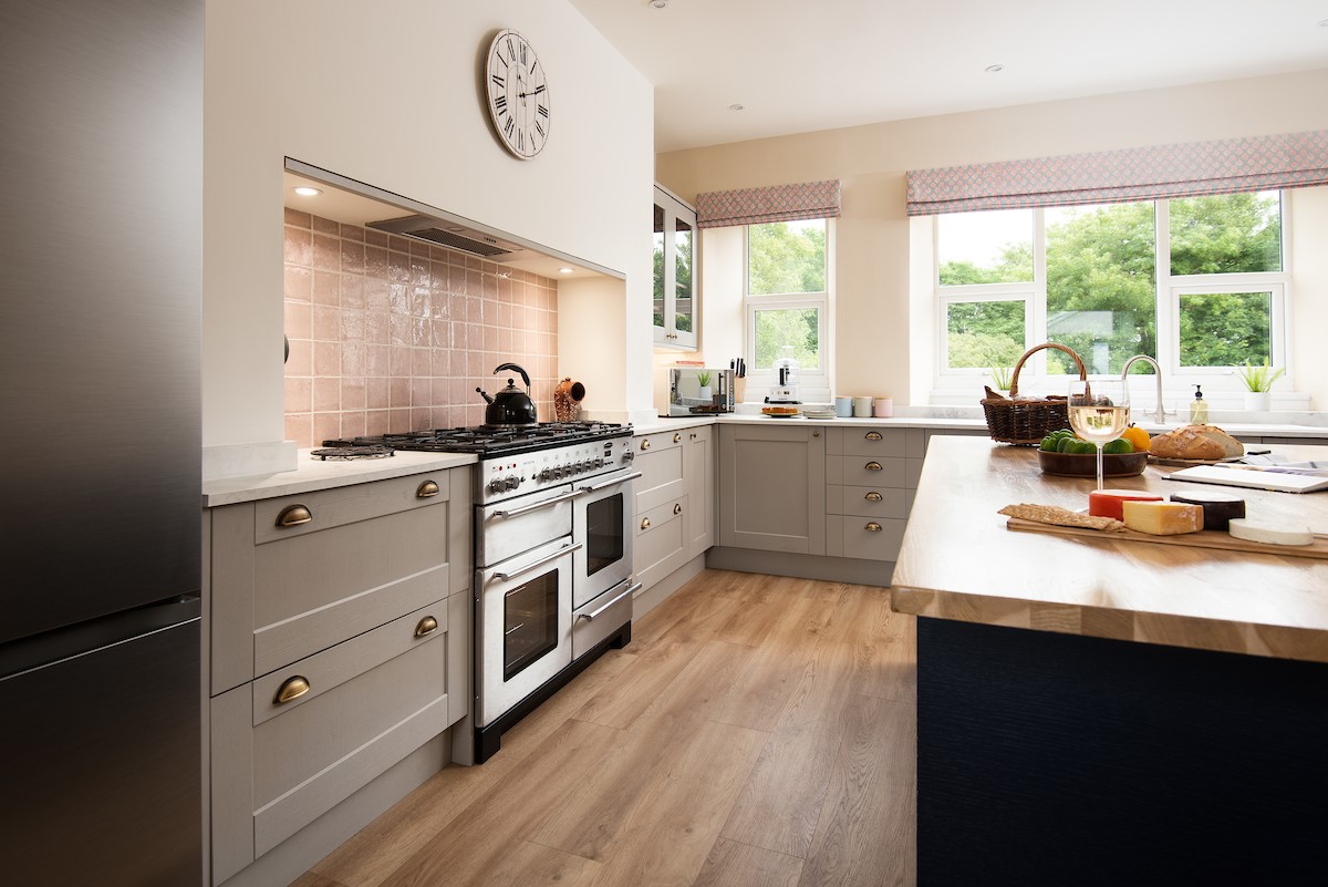 Wark Farmhouse - the kitchen with large Rangemaster cooker