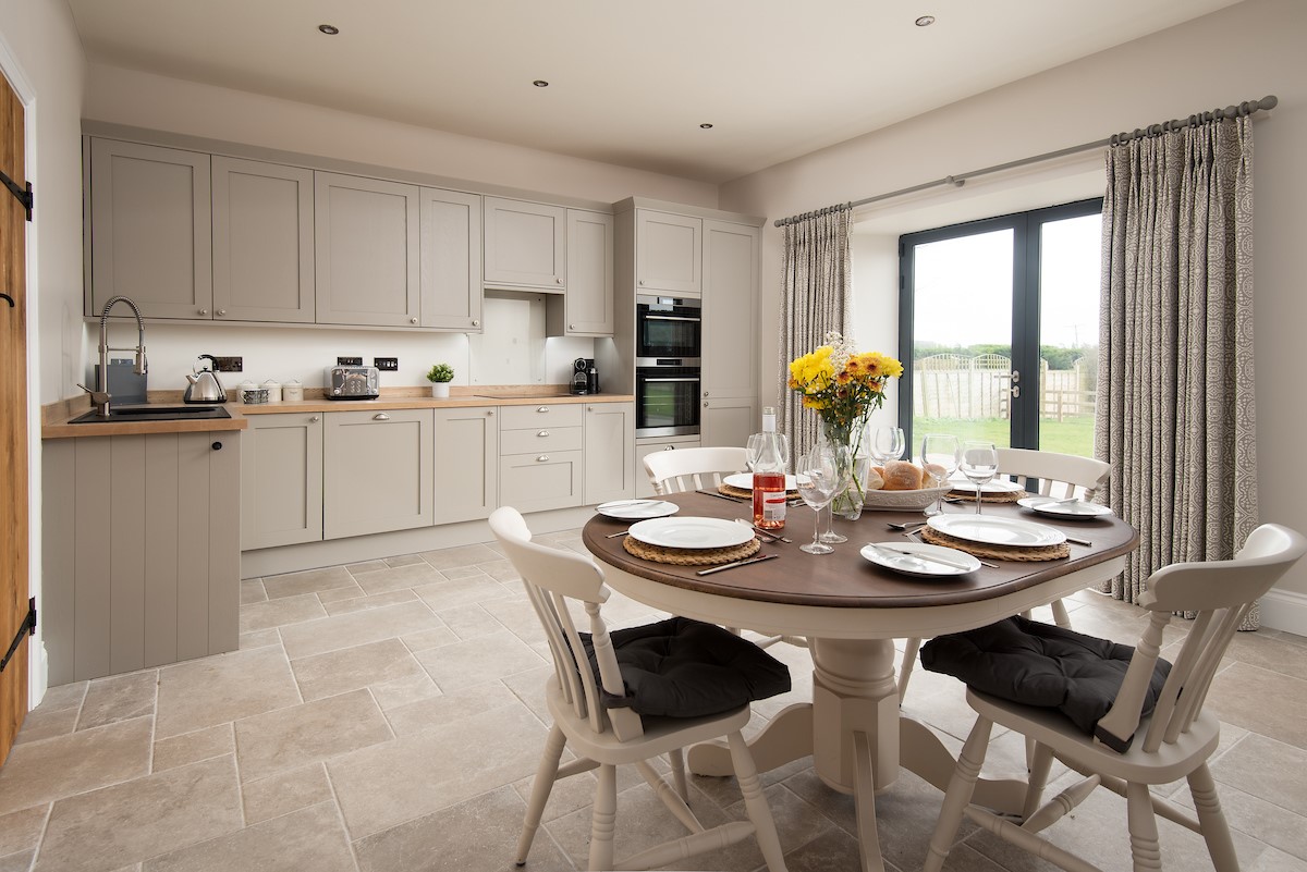 Mill Cottage, Brockmill Farm - bright and spacious kitchen and dining area with large French door leading out to the garden