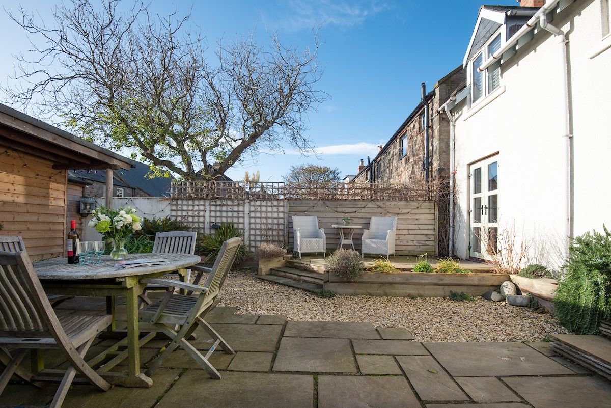The Arch - enjoy alfresco meals in the patio garden to the rear of the property
