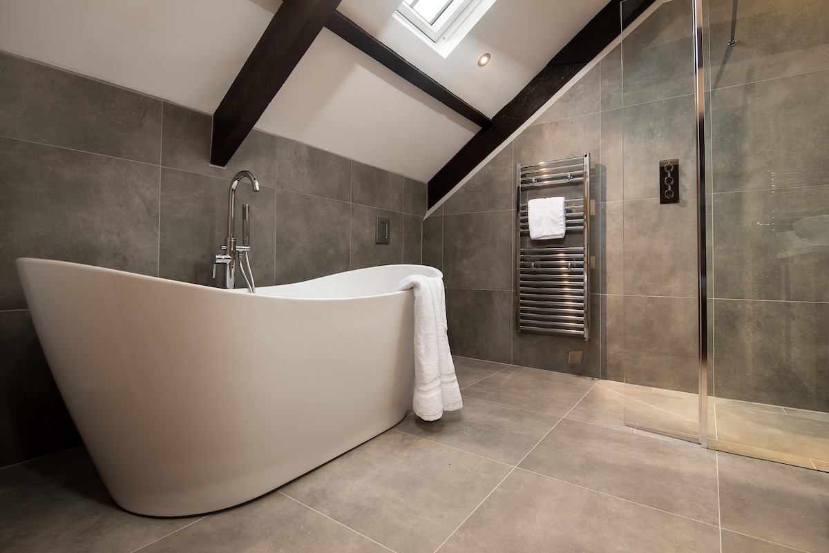 The Gallery - en-suite bathroom with free standing bath and separate shower