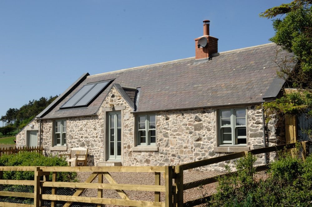 Barley Hill Cottage - the exterior of the cottage with beautiful stonework