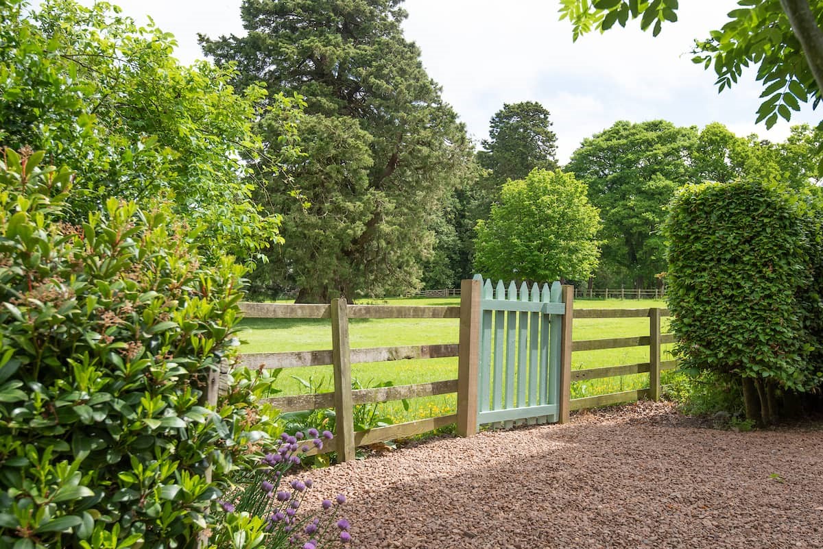Lane Cottage - pretty picket gates lead onto estate walks
