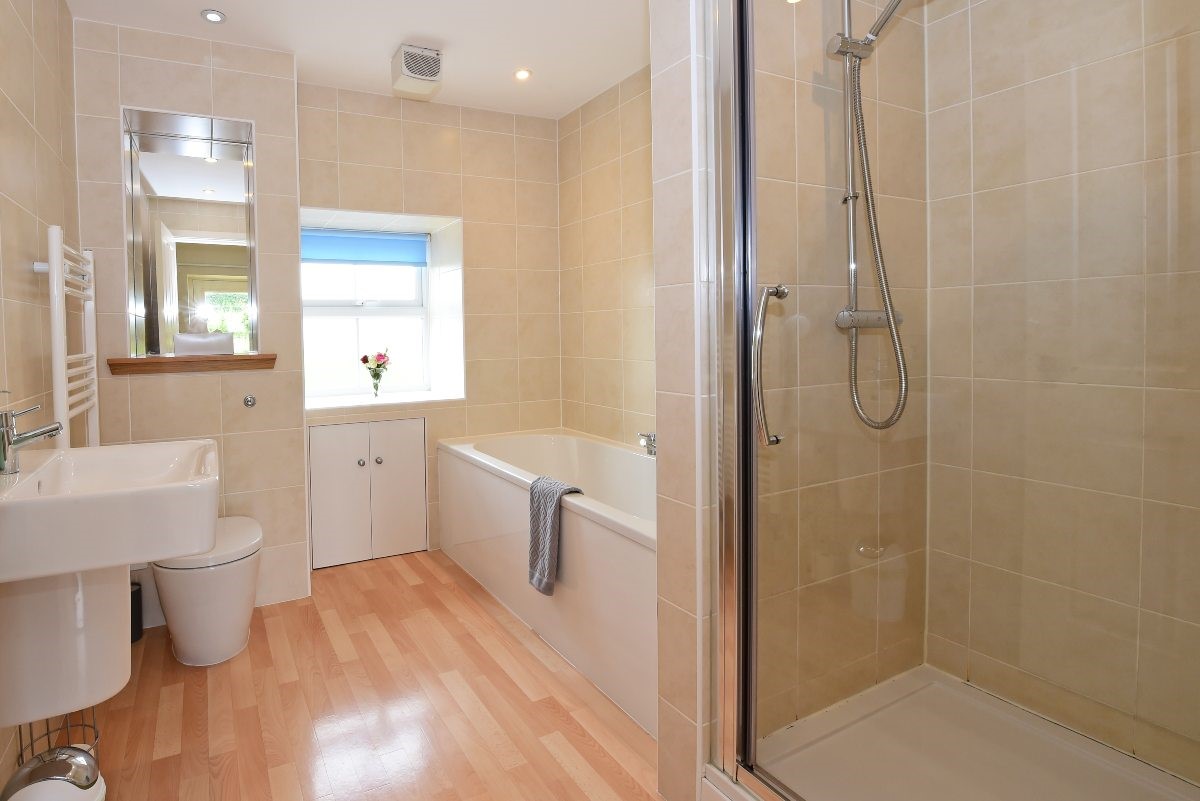 Hawthorn House - family bathroom with bath and separate shower with rainforest shower head