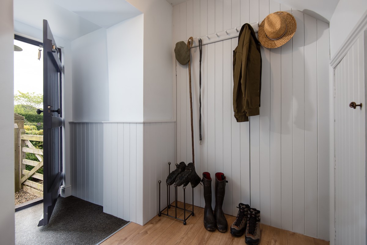 Cuthbert House - space for hanging coats and storing boots after a day walking