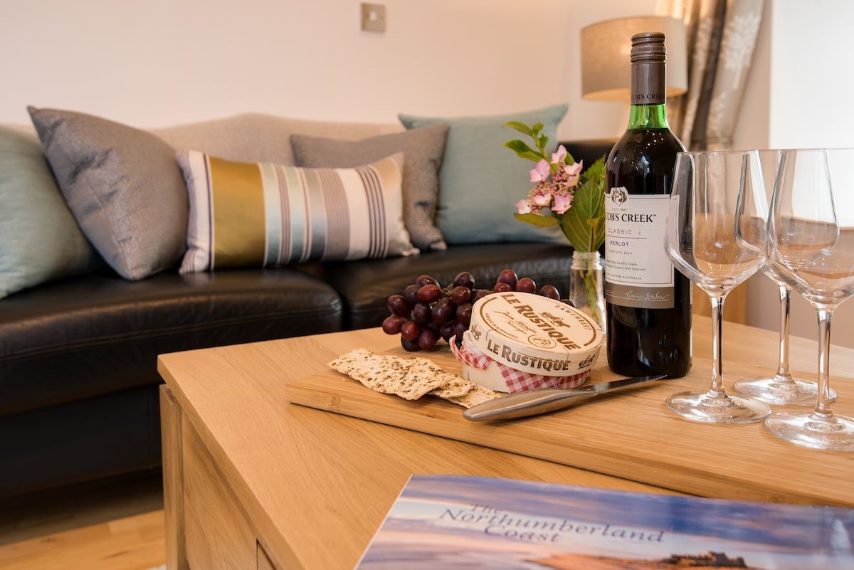 Budle Bay Loft - enjoy a glass of wine with a view over Budle Bay