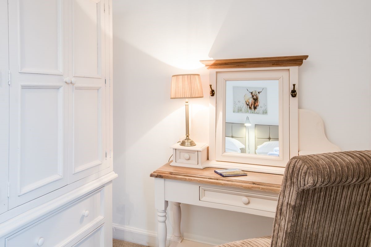 Chestnut Cottage - the dressing table and wardrobe in bedroom two