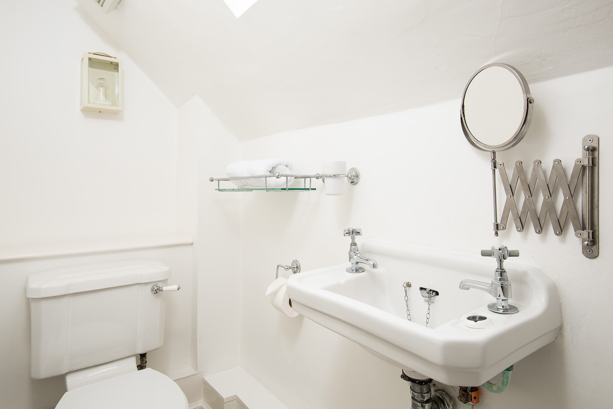 Swan's Nest - cloakroom on the first floor with basin and WC