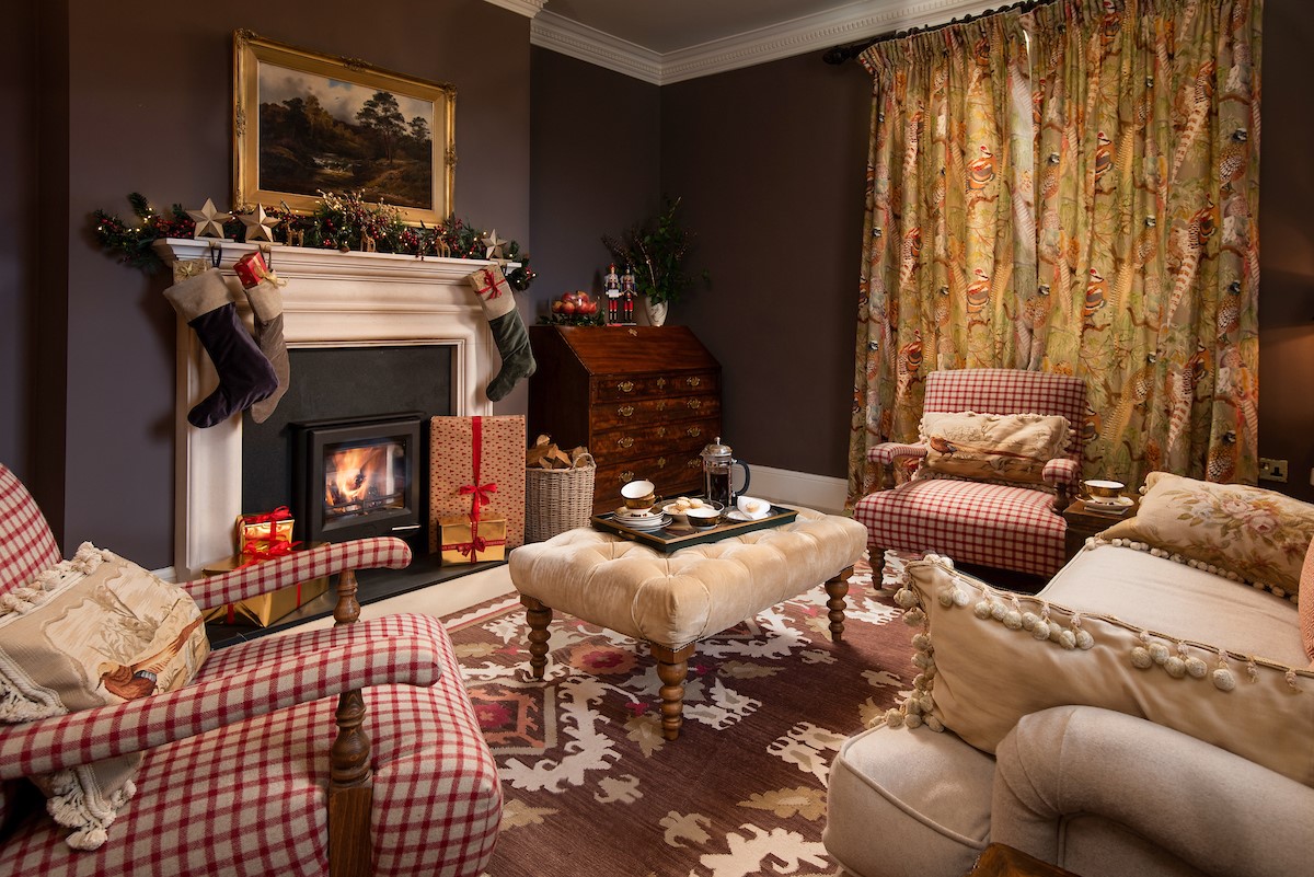 Broadgate House - cosy sitting room ideal for relaxing after a busy day of festive fun with family and friends