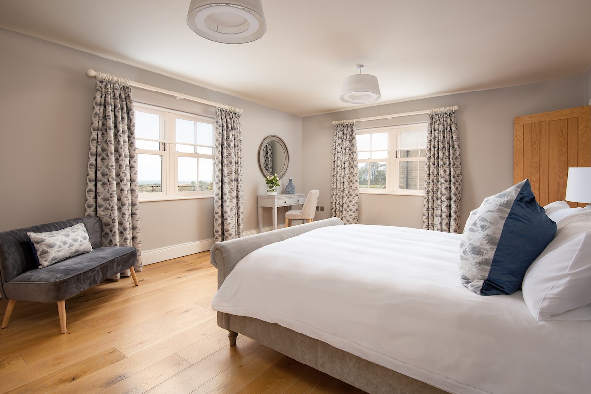 Bracken Lodge - bedroom one benefits from dual aspect windows