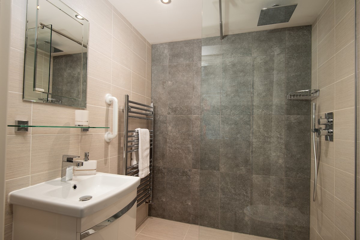 The Barley Loft - en-suite shower room with large walk in shower with rainforest shower head and separate shower attachment
