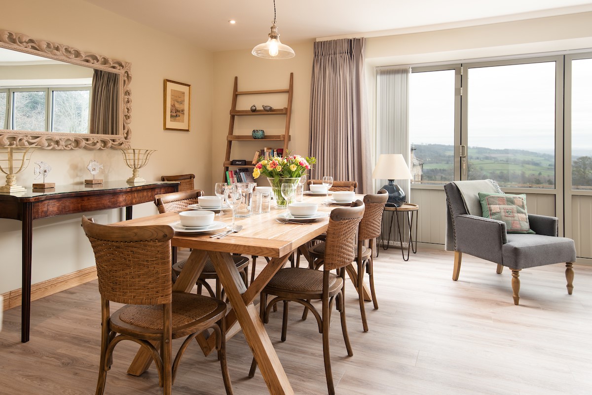 Old Granary House - bright open-plan living space with spacious dining area and access to the patio from the large bi-folding doors