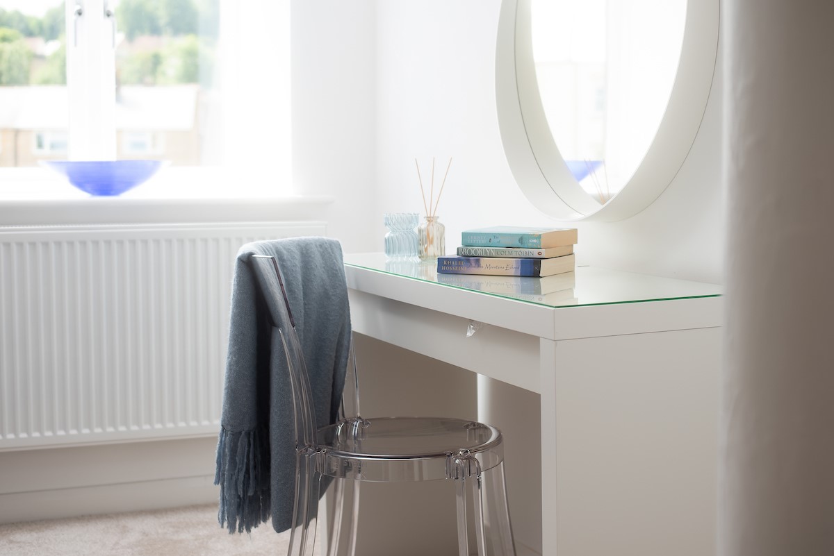 The Barley Loft - dressing table in bedroom two with large mirror above