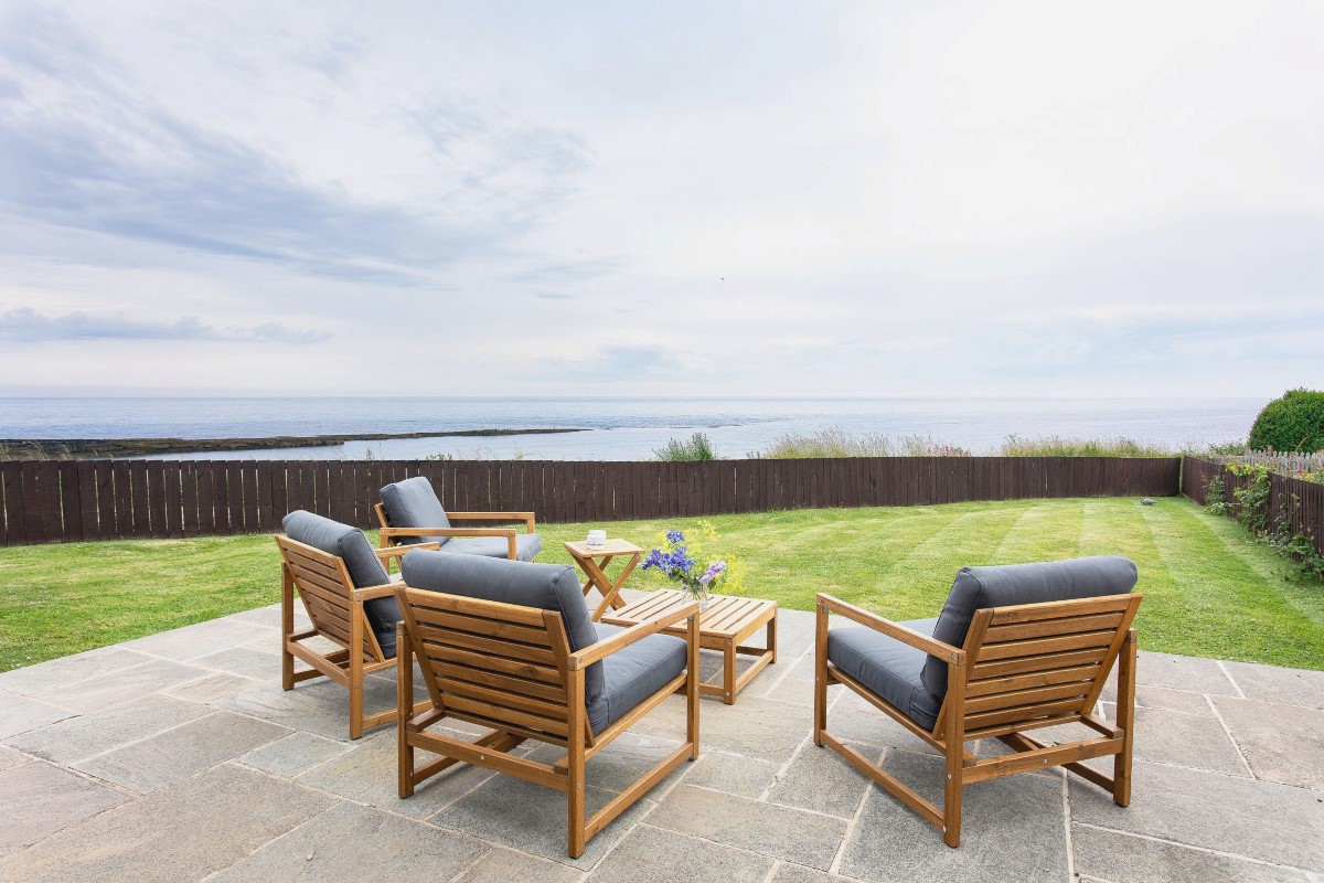 Sea Breeze - enclosed garden with outdoor furniture offering fabulous sea views