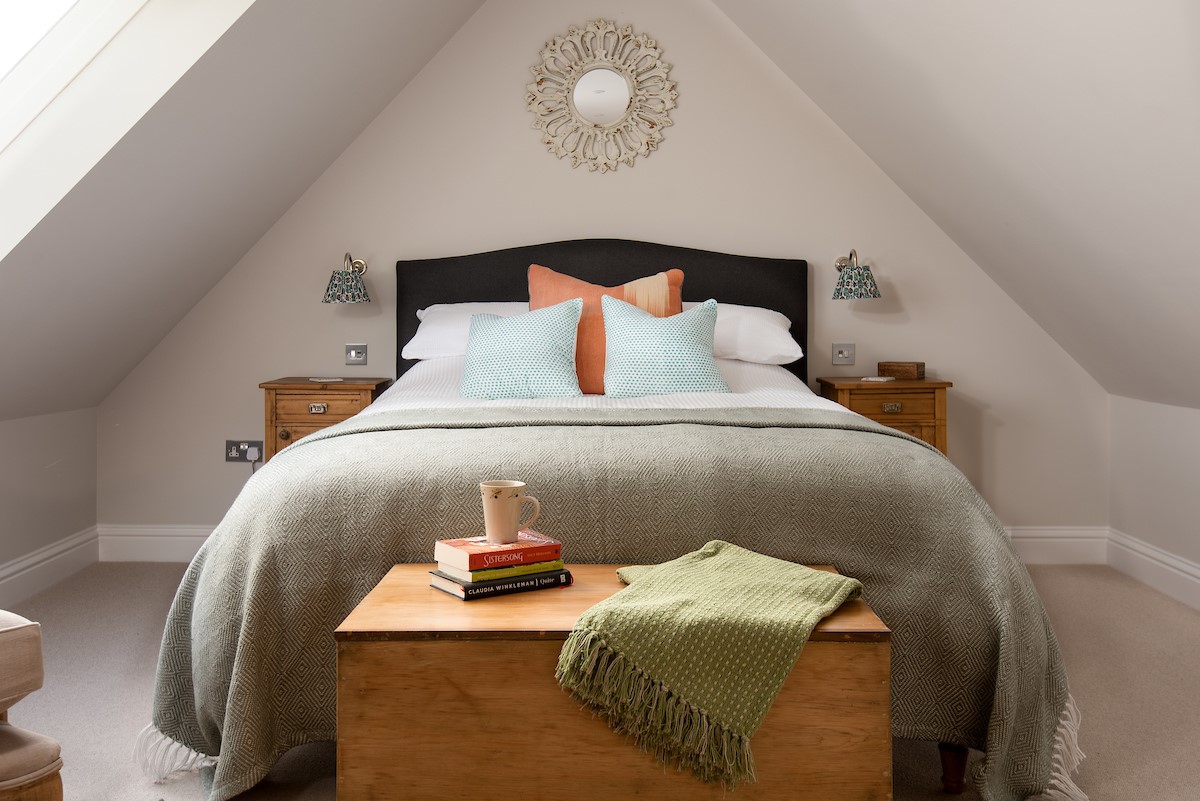Greenhead Cottage - bedroom two with king size bed and vaulted ceiling