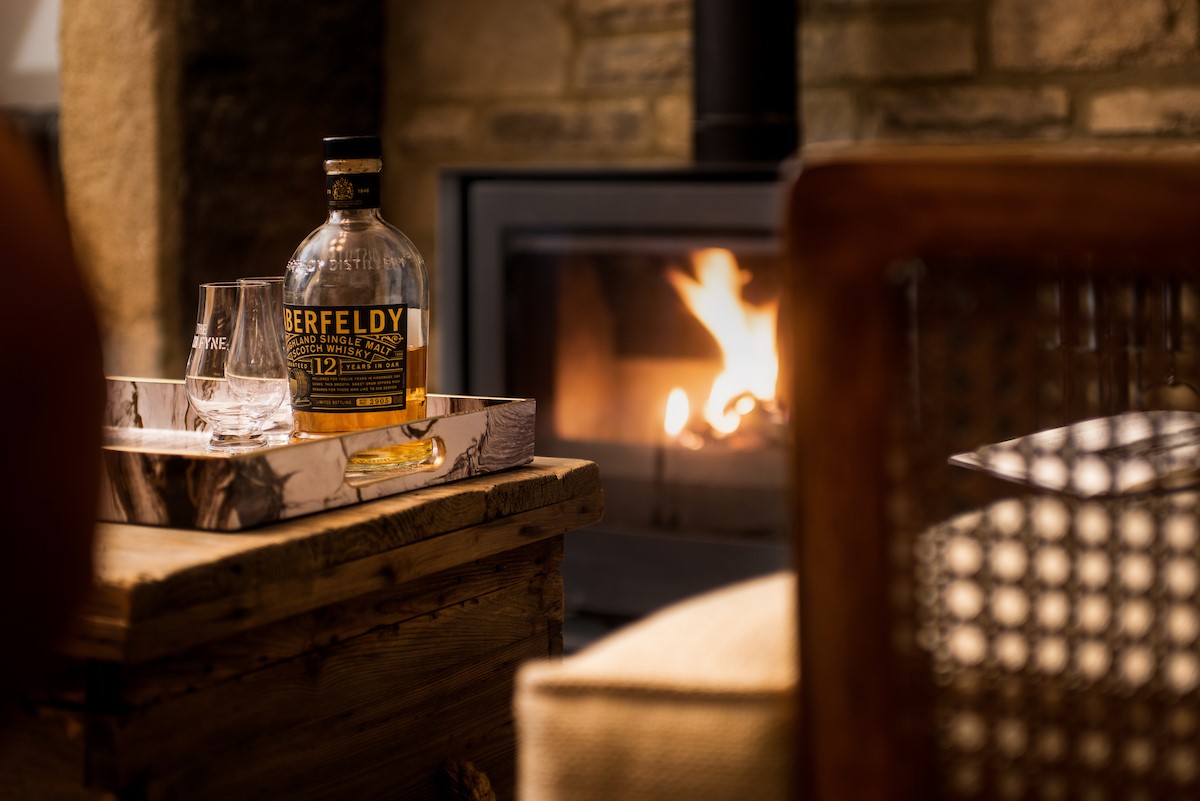 The Lodge, Lesbury - enjoy the warmth of the wood burner with a wee dram