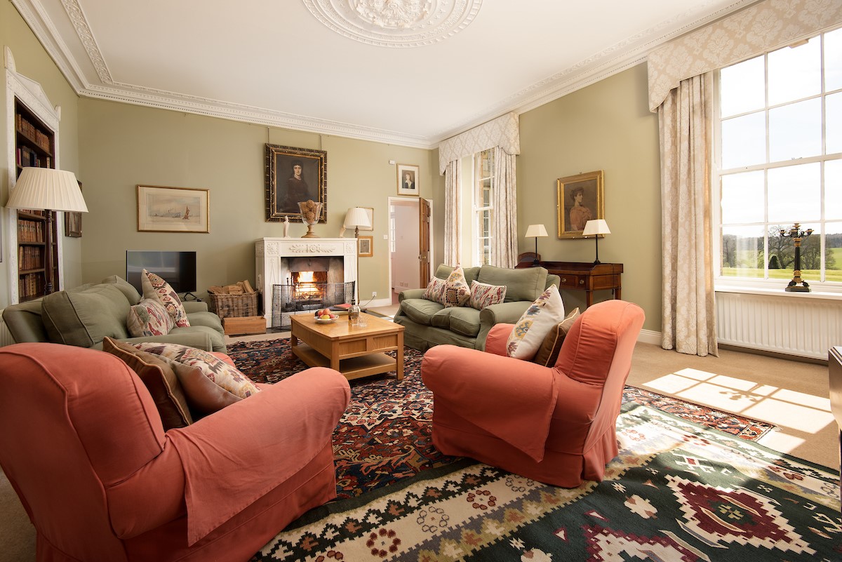 The West Wing, Capheaton - the sumptuous lounge with period features and an open fire