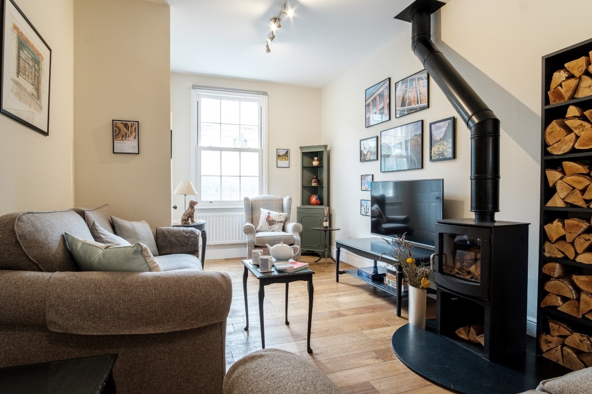 Number 107 - comfortable seating with a Smart television and woodburning stove