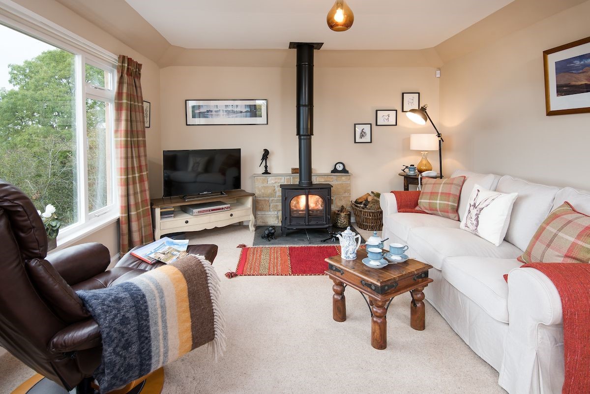 Pennine Way Cottage - sitting room with wood burning stove