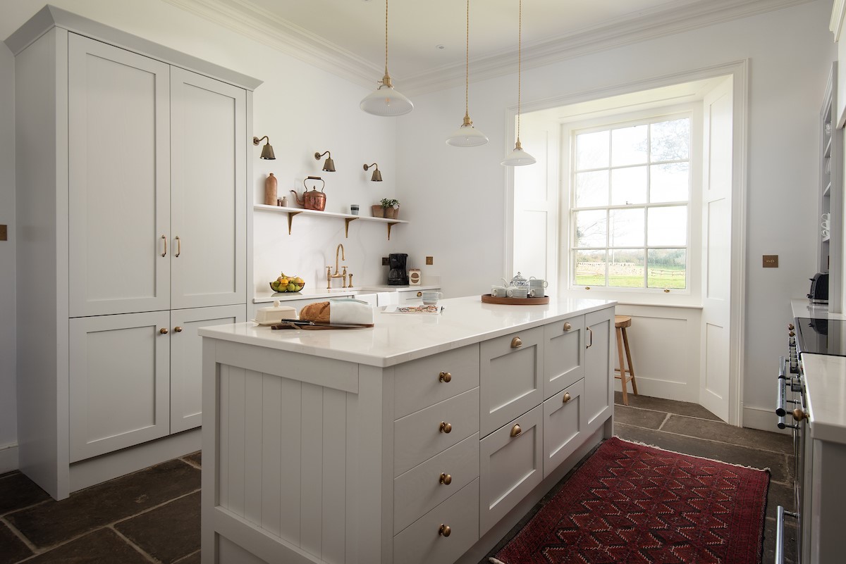 The Old Vicarage - well-equipped shaker style kitchen with range oven and hob, under counter fridge, dishwasher and microwave