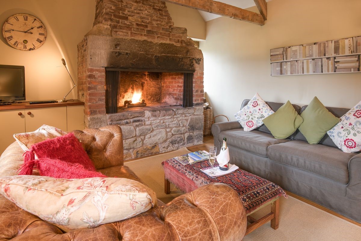 The Smithy, Crookham - sitting room fireside