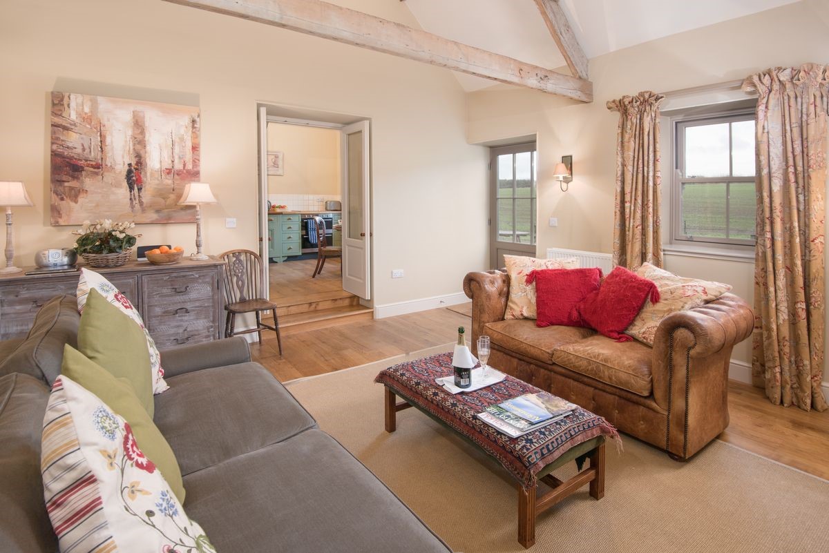 The Smithy, Crookham - sitting room with kitchen access