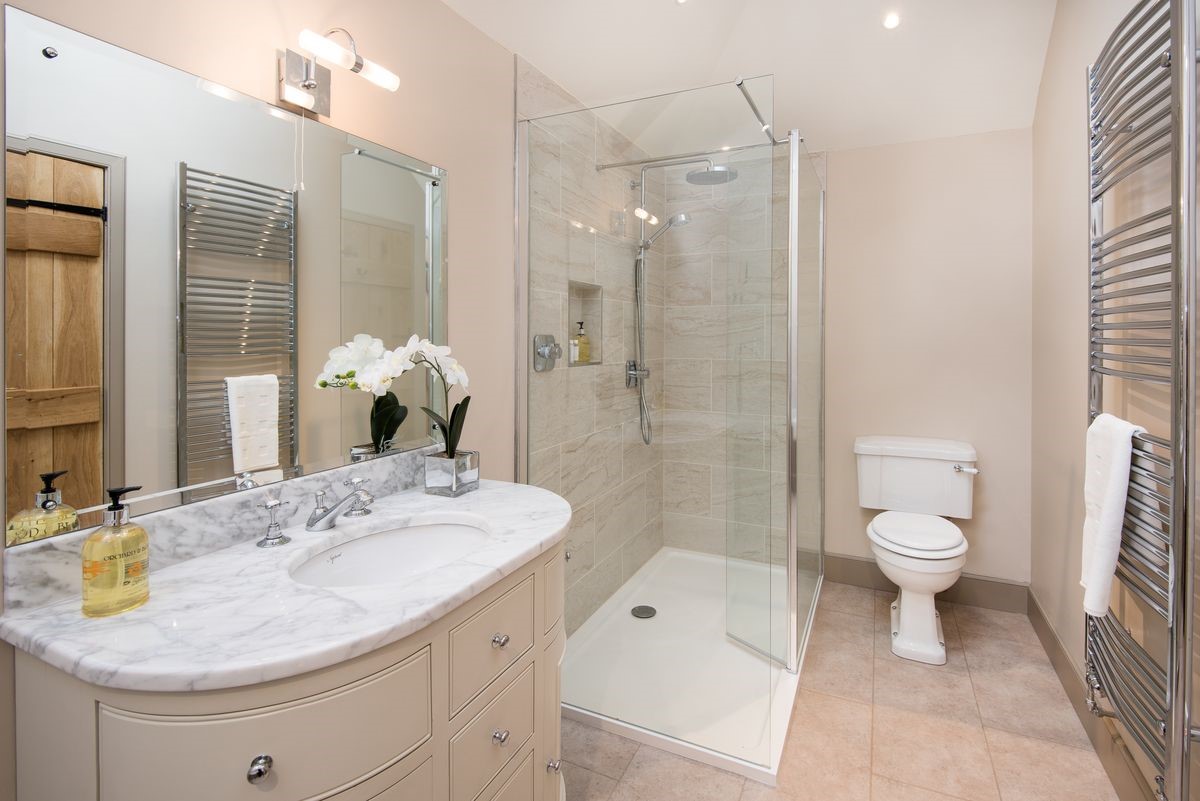 Crookhouse Mill - bedroom four en suite bathroom on the first floor with large walk-in shower, WC and basin