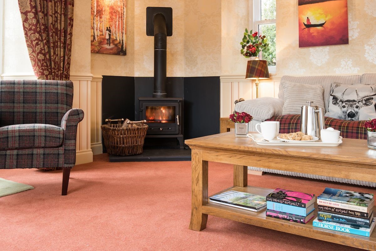 Dryburgh Farmhouse - cosy wood burner in the sitting room