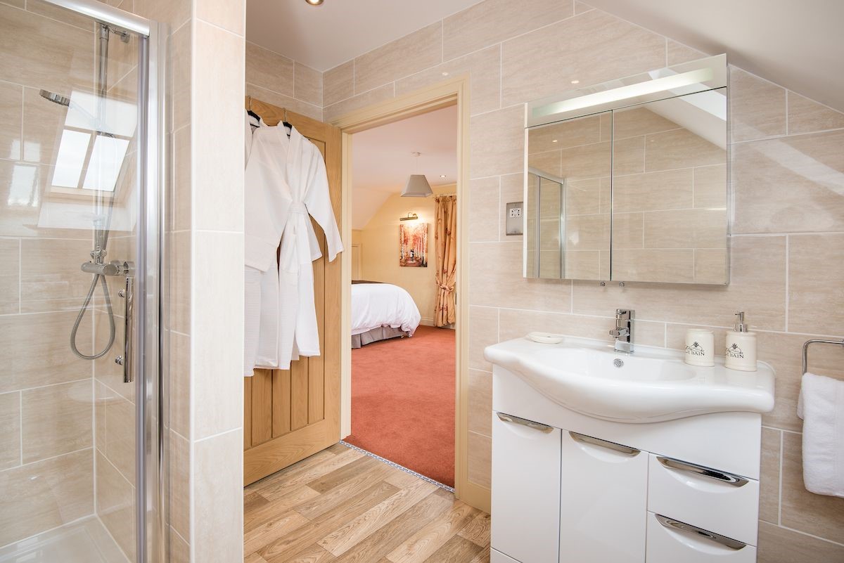 Dryburgh Farmhouse - bedroom three en suite featuring a large shower with rainforest head