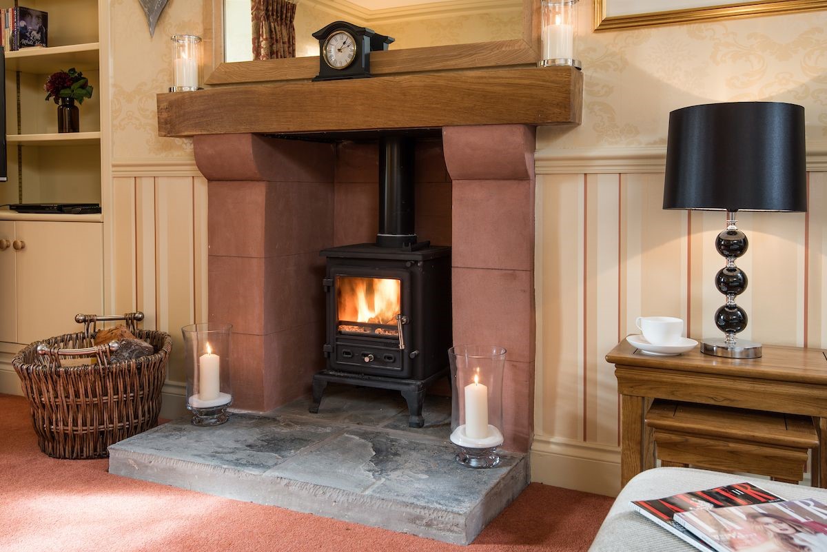 Dryburgh Farmhouse - cosy wood burner in the lounge