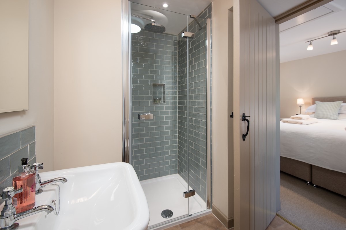 Dipper Cottage - bedroom two en-suite shower room with walk-in shower, WC and basin