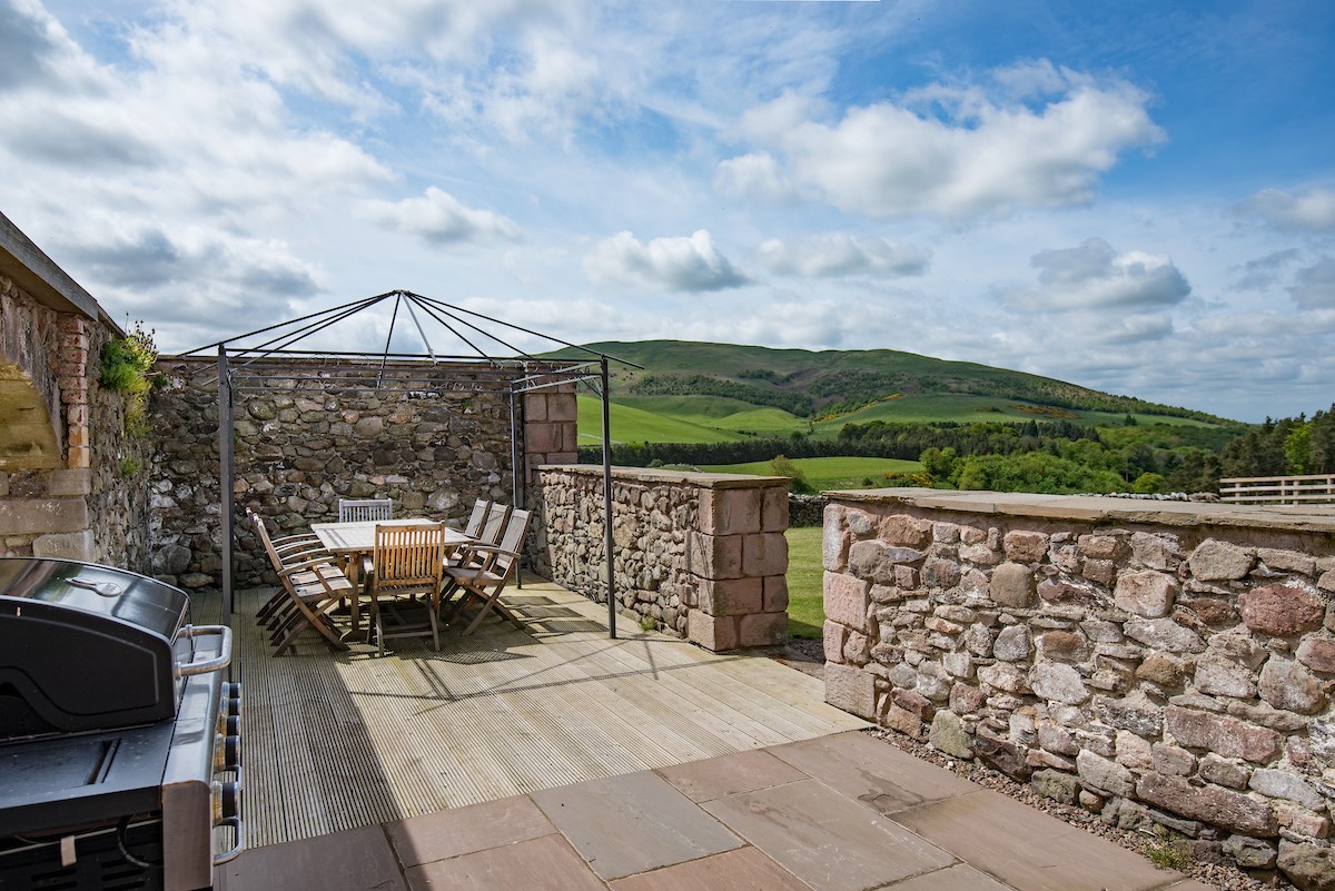 Crookhouse Mill - patio area with outside seating for eight guests and barbecue
