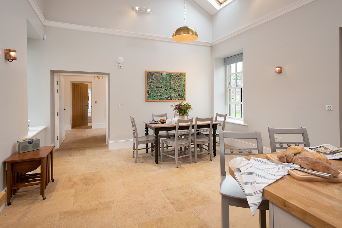 Beeswing - the spacious kitchen with dining space for six guests