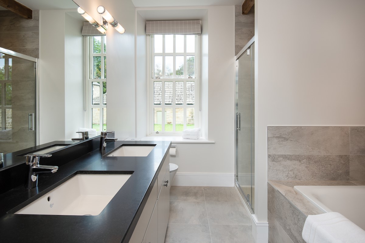 Beeswing - family bathroom with double basins, bath and walk-in shower