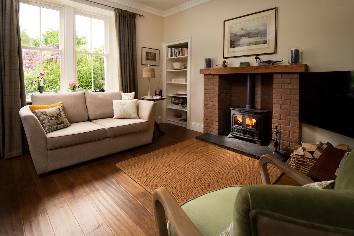 Pentland Cottage - the sitting room is the perfect place to curl up after a long day exploring