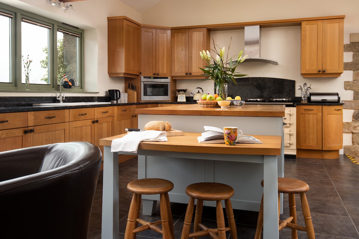 East Lodge - breakfast bar and the expansive kitchen island; perfect for convivial cooking