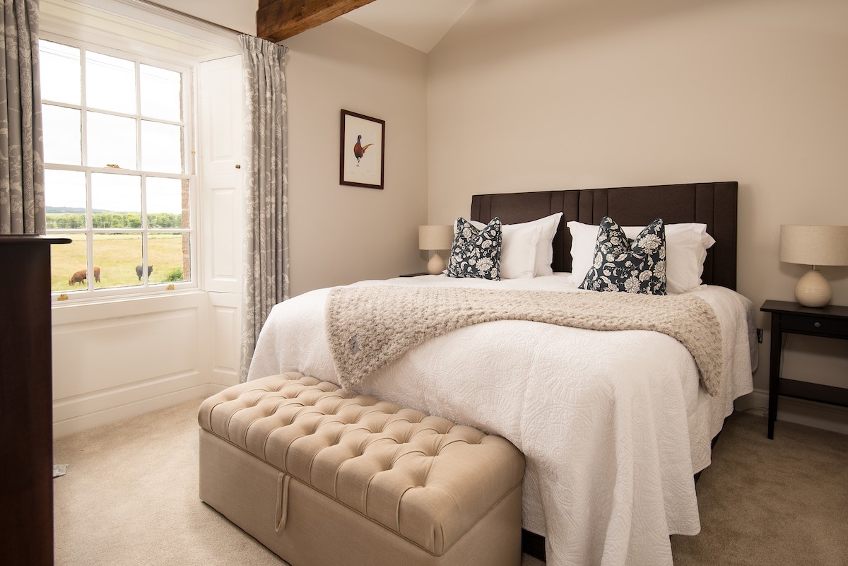 Brockmill Farmhouse - bedroom six on the first floor with zip and link beds