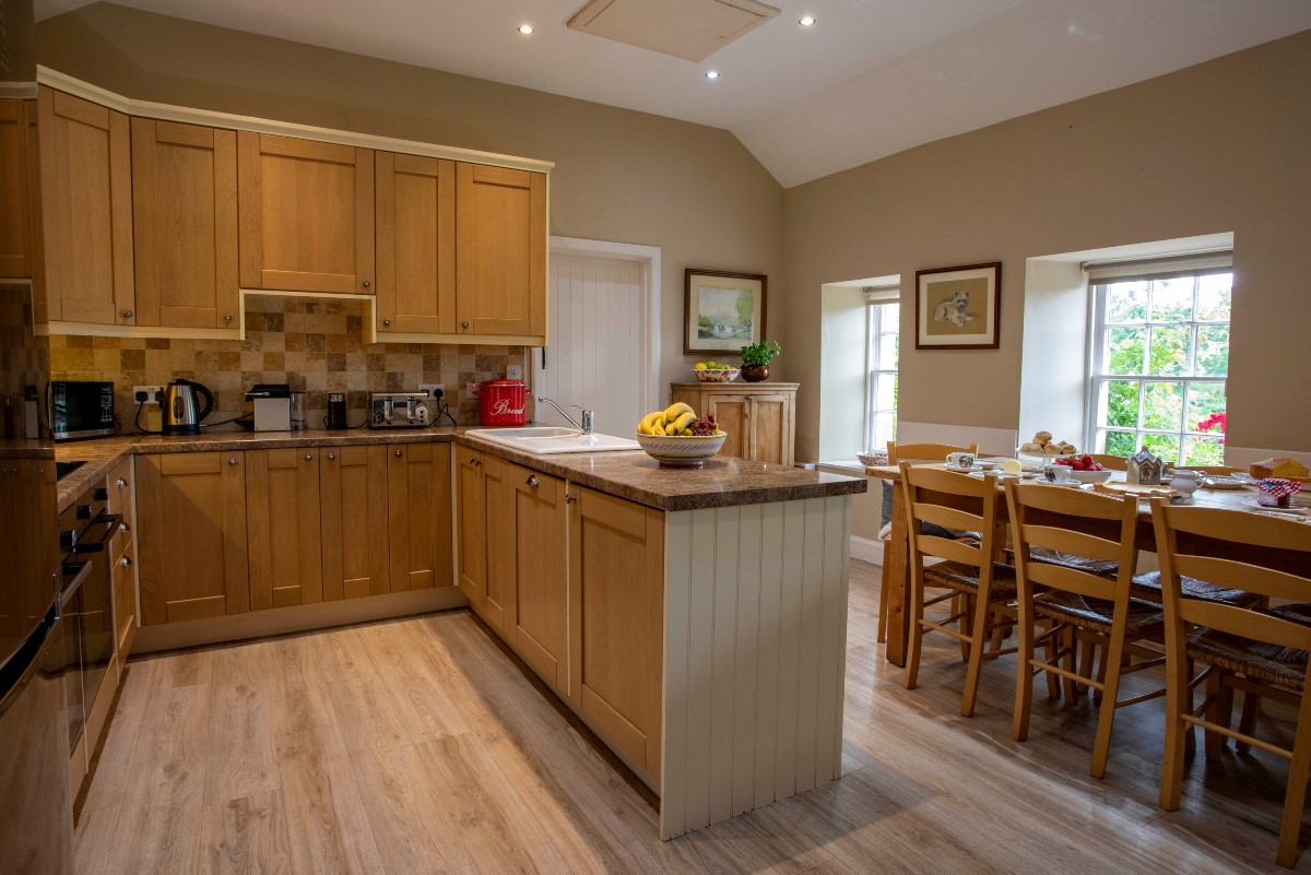 The Boathouse - the kitchen with views of the River Tweed