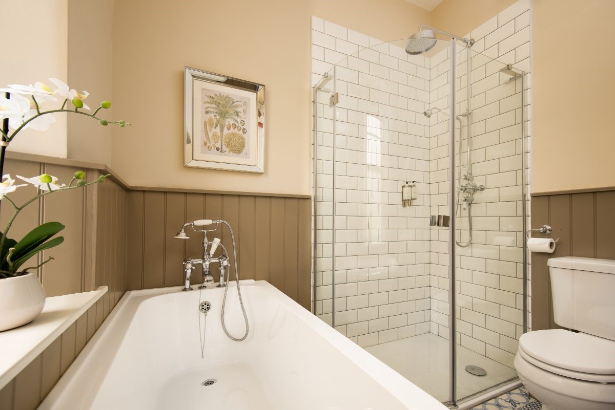 Birch Cottage - the family bathroom features a freestanding bathtub and separate walk-in shower