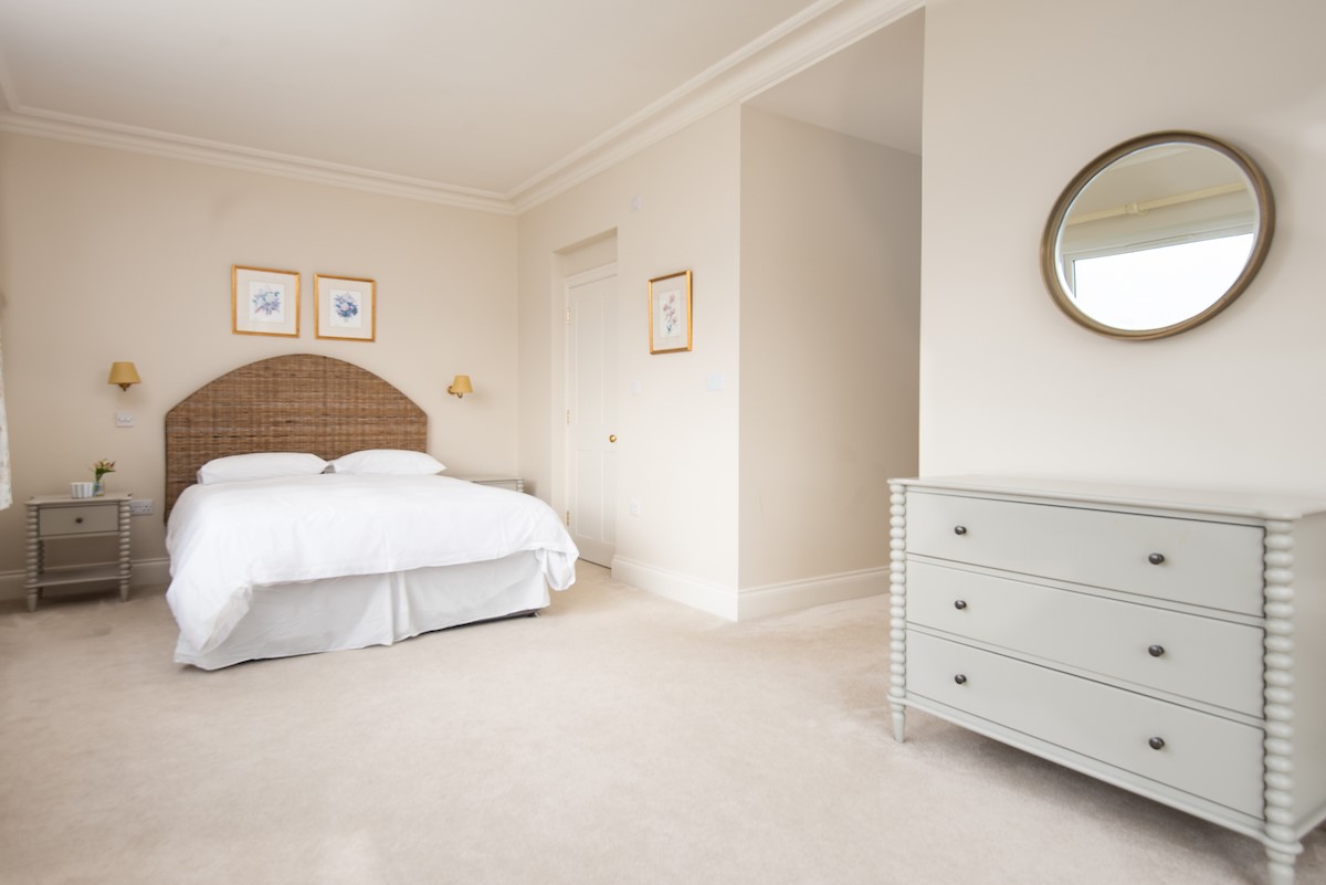 Riverhill Cottage - bedroom two - spacious master bedroom with double bed and chest of drawers