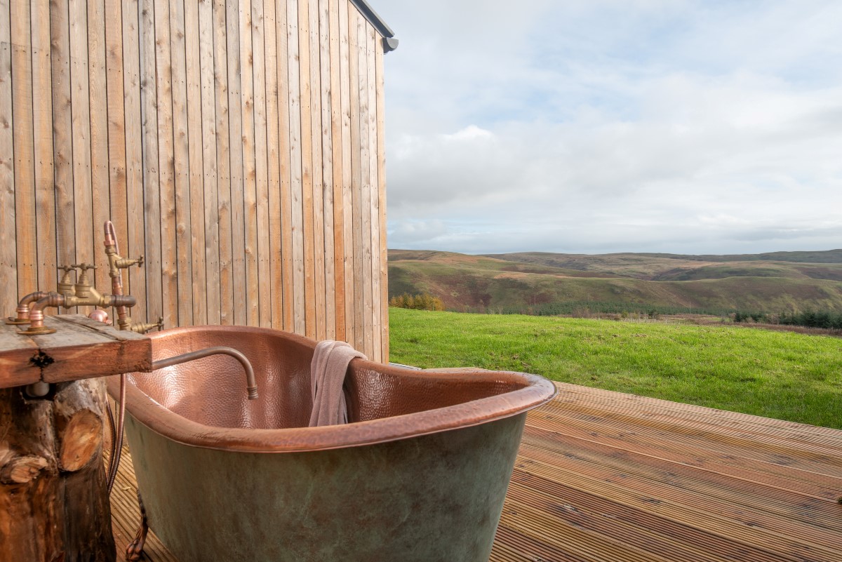 The Oak - relax and enjoy views of the valley whilst taking a soak in the copper Shaanti bath