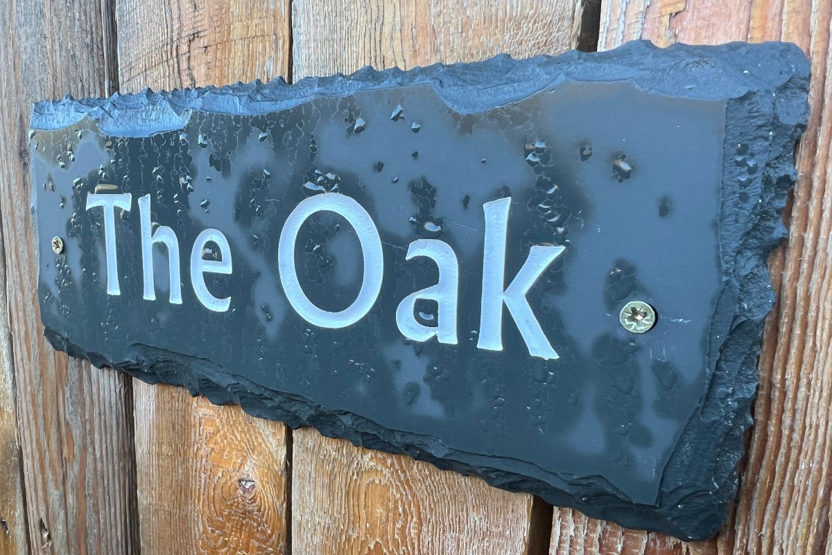 The Oak - slate welcome sign