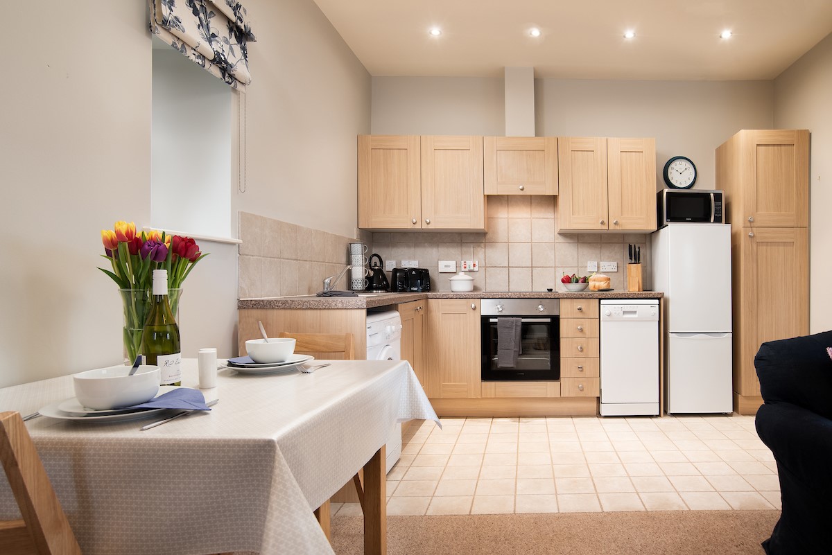 The Bothy at Cheswick - spacious kitchen area with all the essentials for your self-catered stay