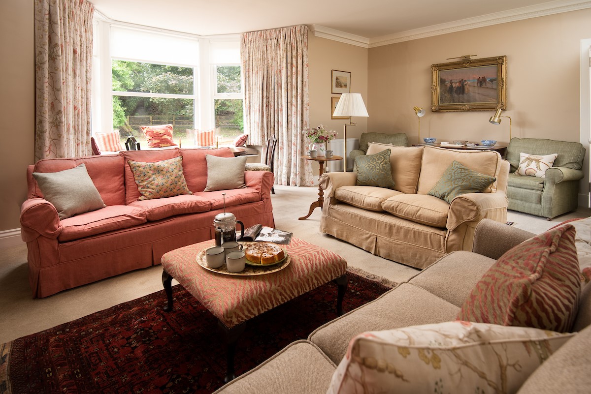 Wark Farmhouse - ample seating for the whole party in the drawing room