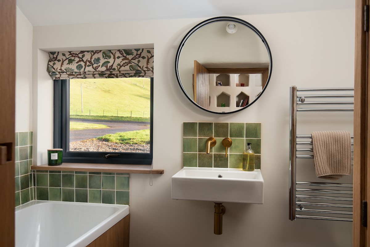 The Dovecot at Reedsford - bathroom with bath, basin, WC and heated towel rail