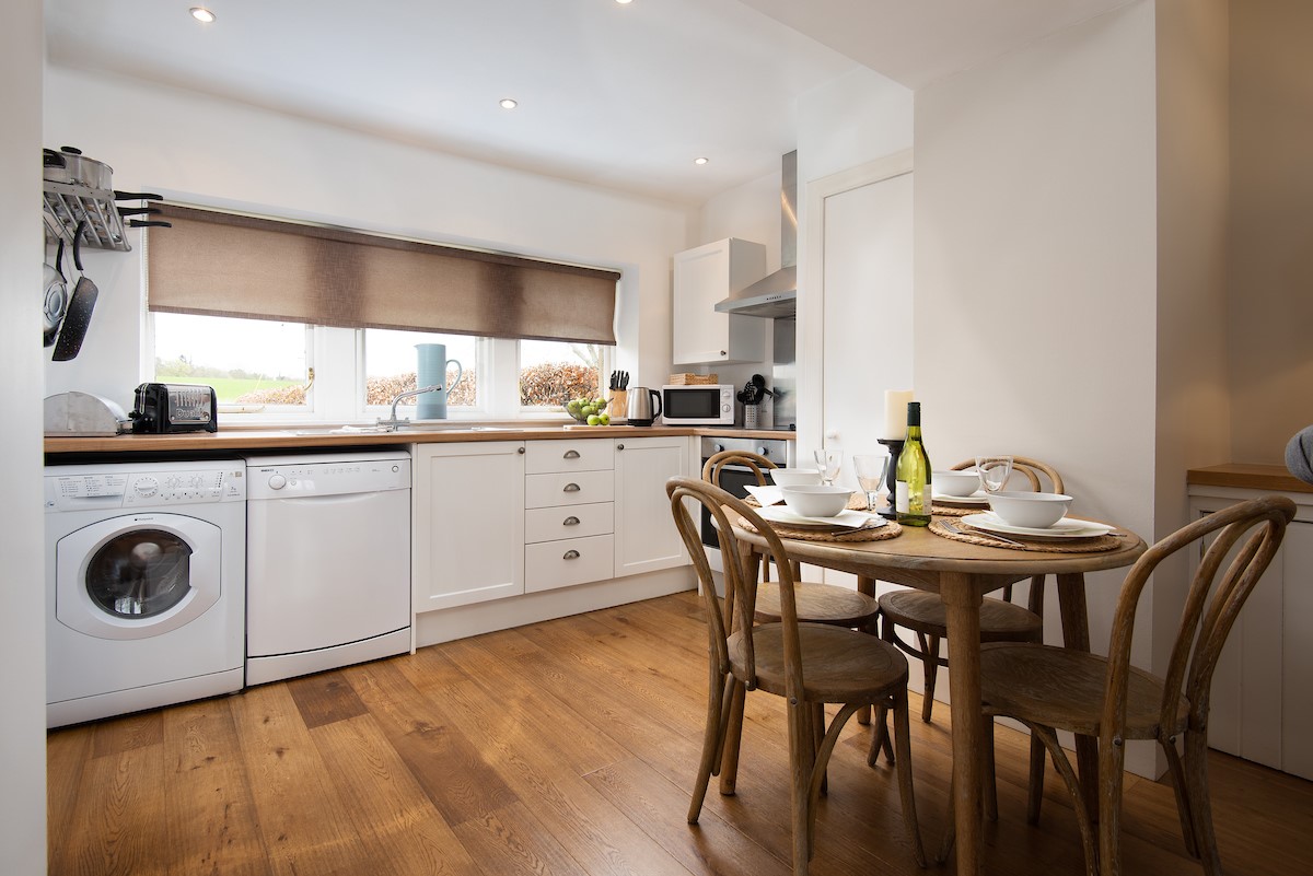 Swan's Nest - the kitchen with dining area is perfectly suited for two or four