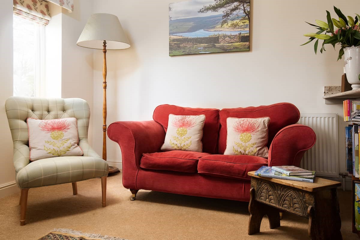 Anvil Cottage - the red sofa in the living room
